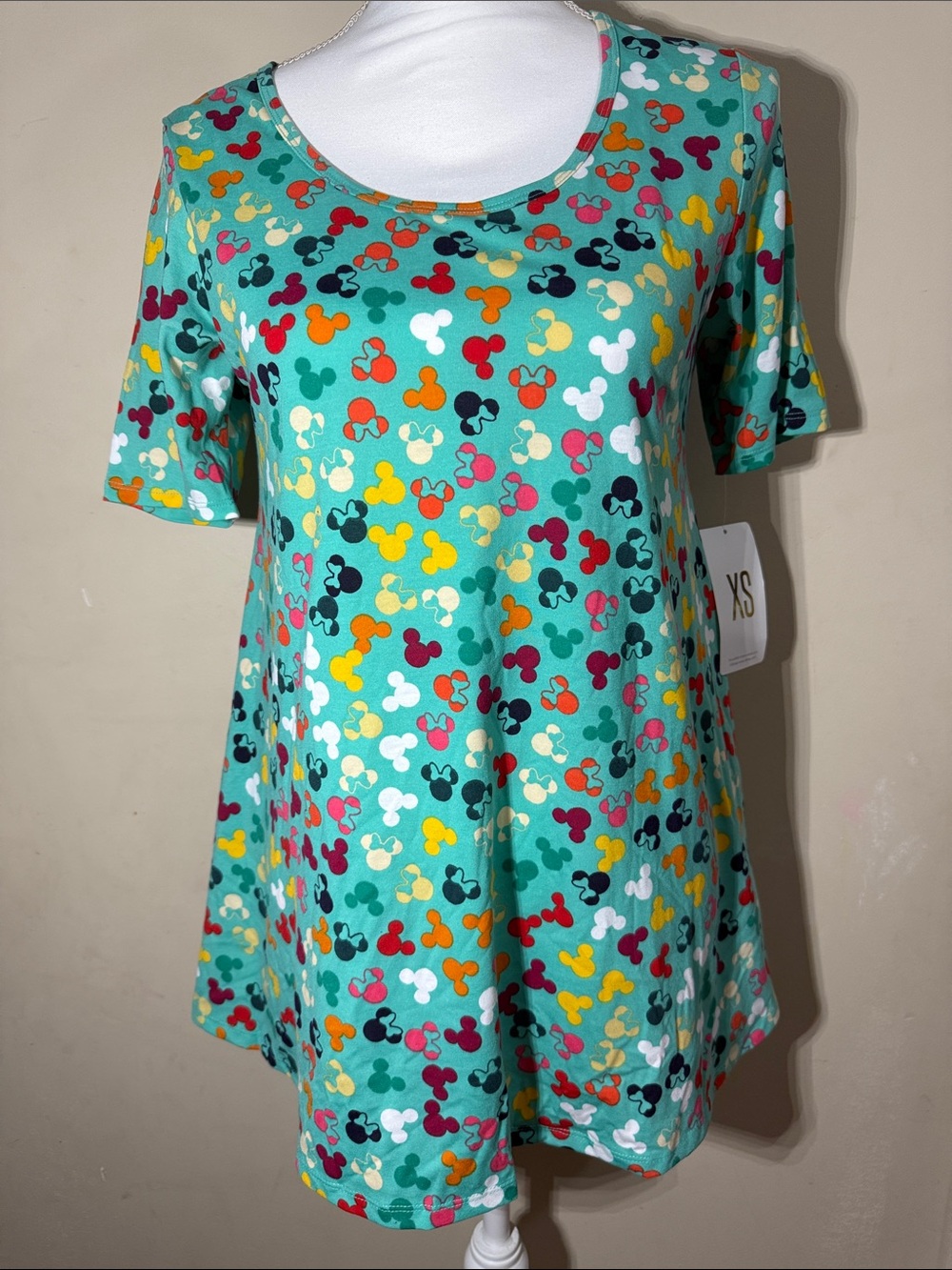 LuLaRoe Mint Green Short Sleeve Tee with Multi-Color Mickey Print Disney